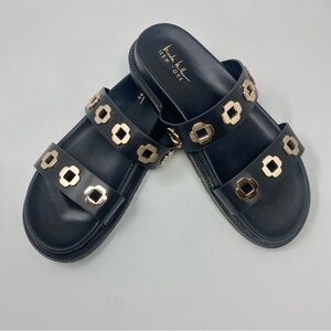 Nicole Miller Cute Elegant Black Slides with Gold Grommet details Sz 8.5 NWOT